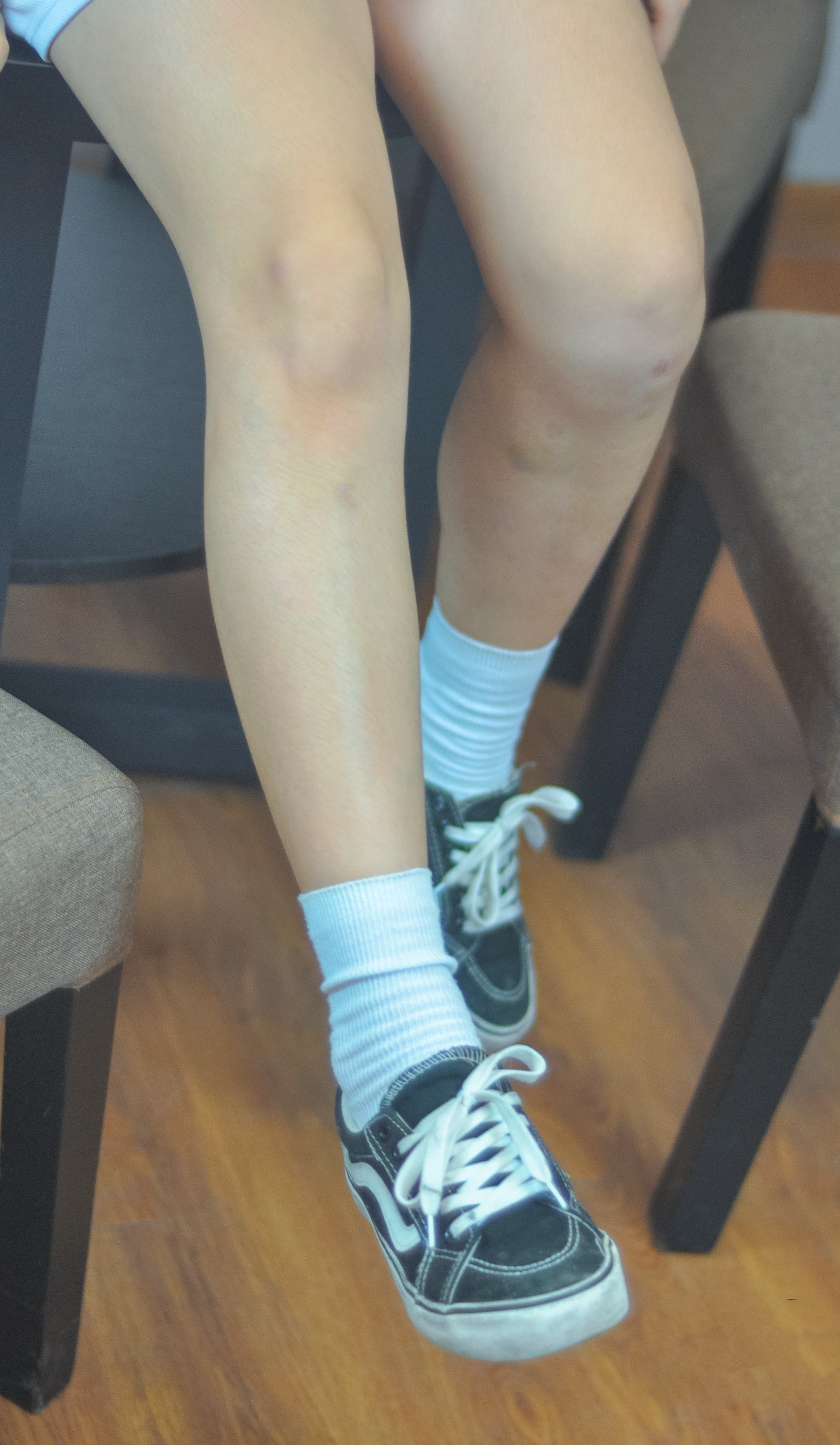 Exposed heel slipping from sneaker edge