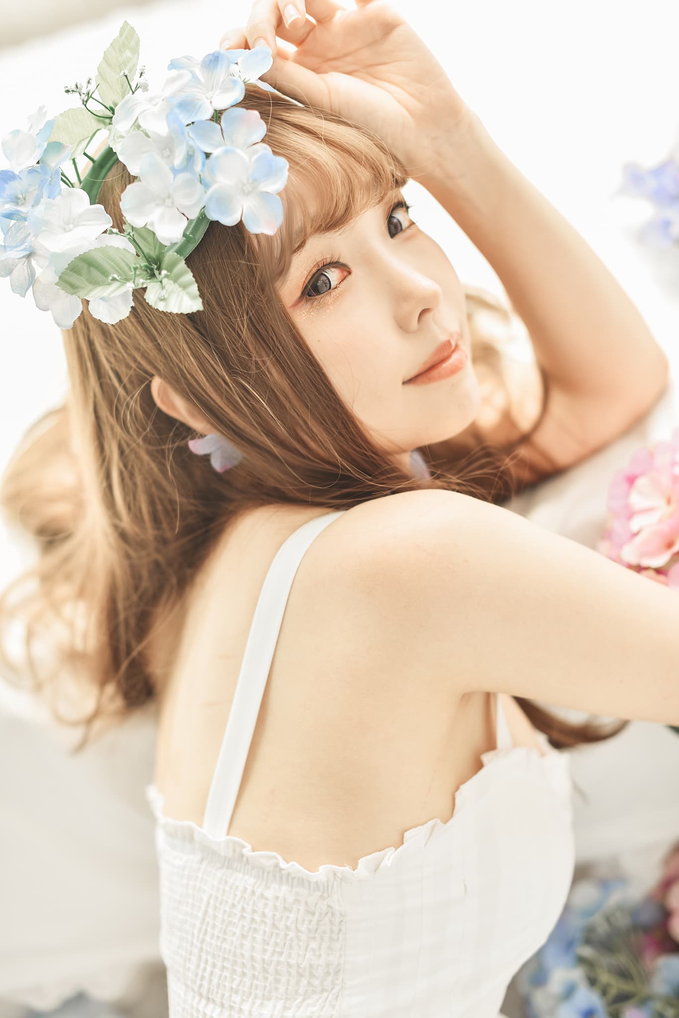 Bare foot under white dress