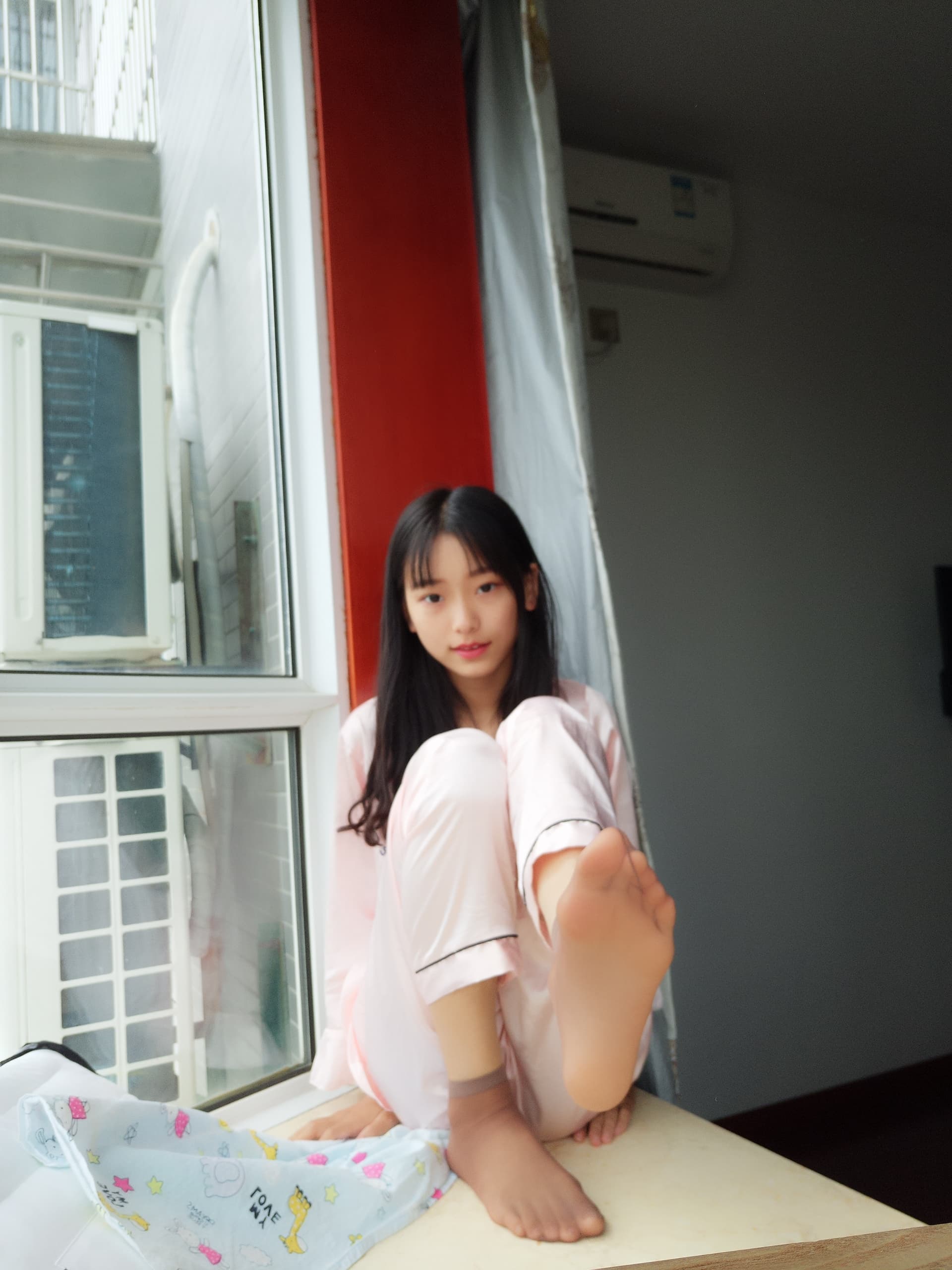 Balcony feet in socks