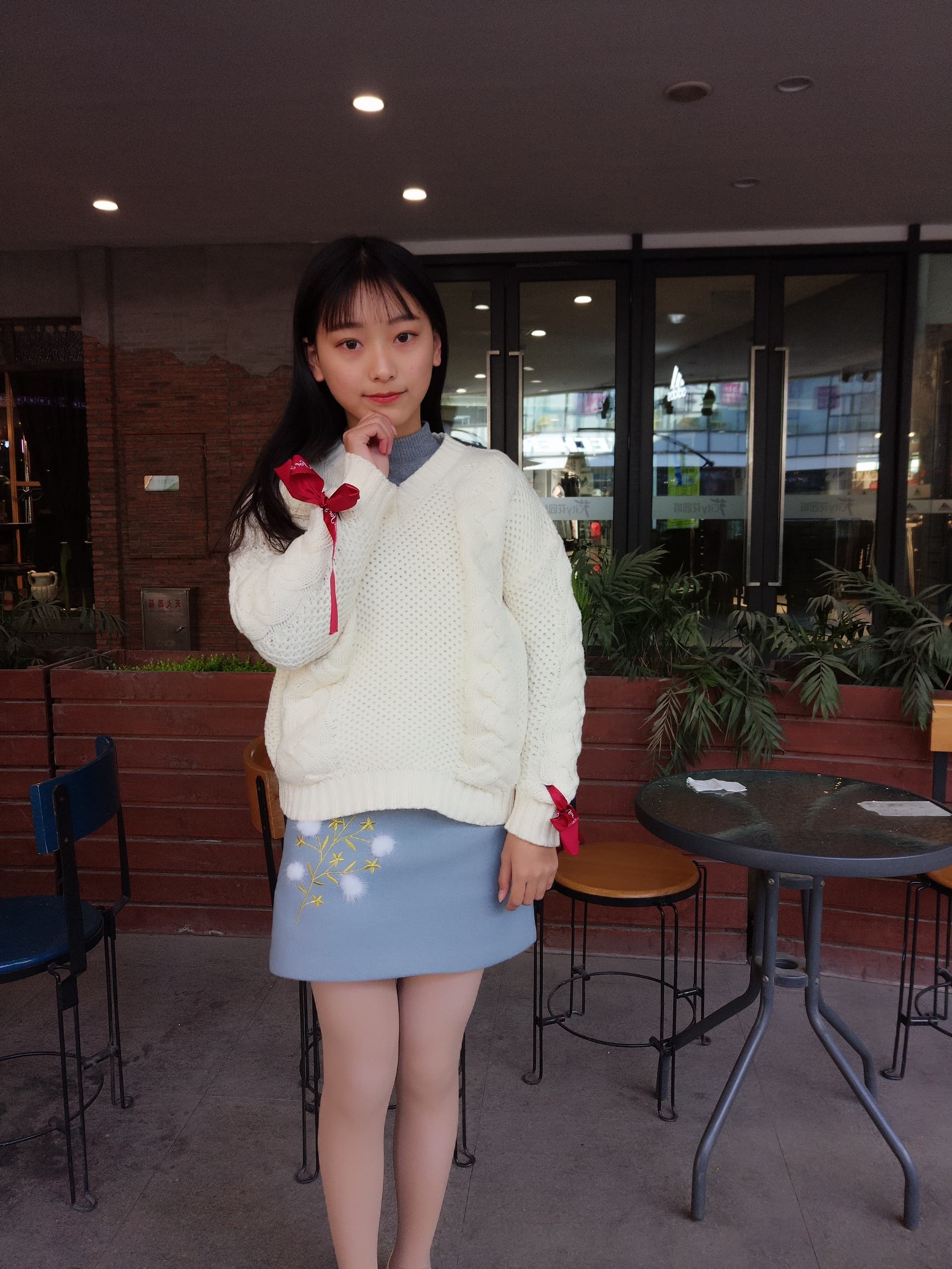 Artful close-up of nylon-covered calves and exposed toes, warm tones and soft shadowing