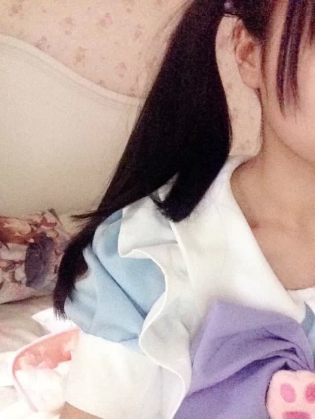 Detail of nylon-clad leg with stocking seam, hand adjusting fabric above exposed ankle and delicate toes