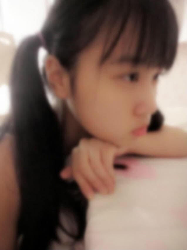 Adult school swim cosplay with glossy swimsuit and stockings, feet peeking out, toes slightly splayed on wet tile