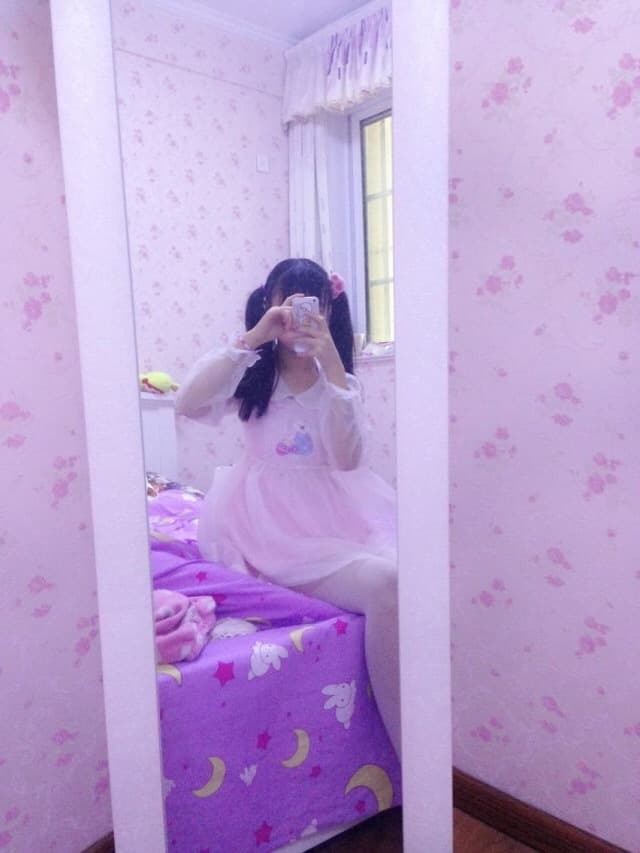 Bare soles glowing under neon