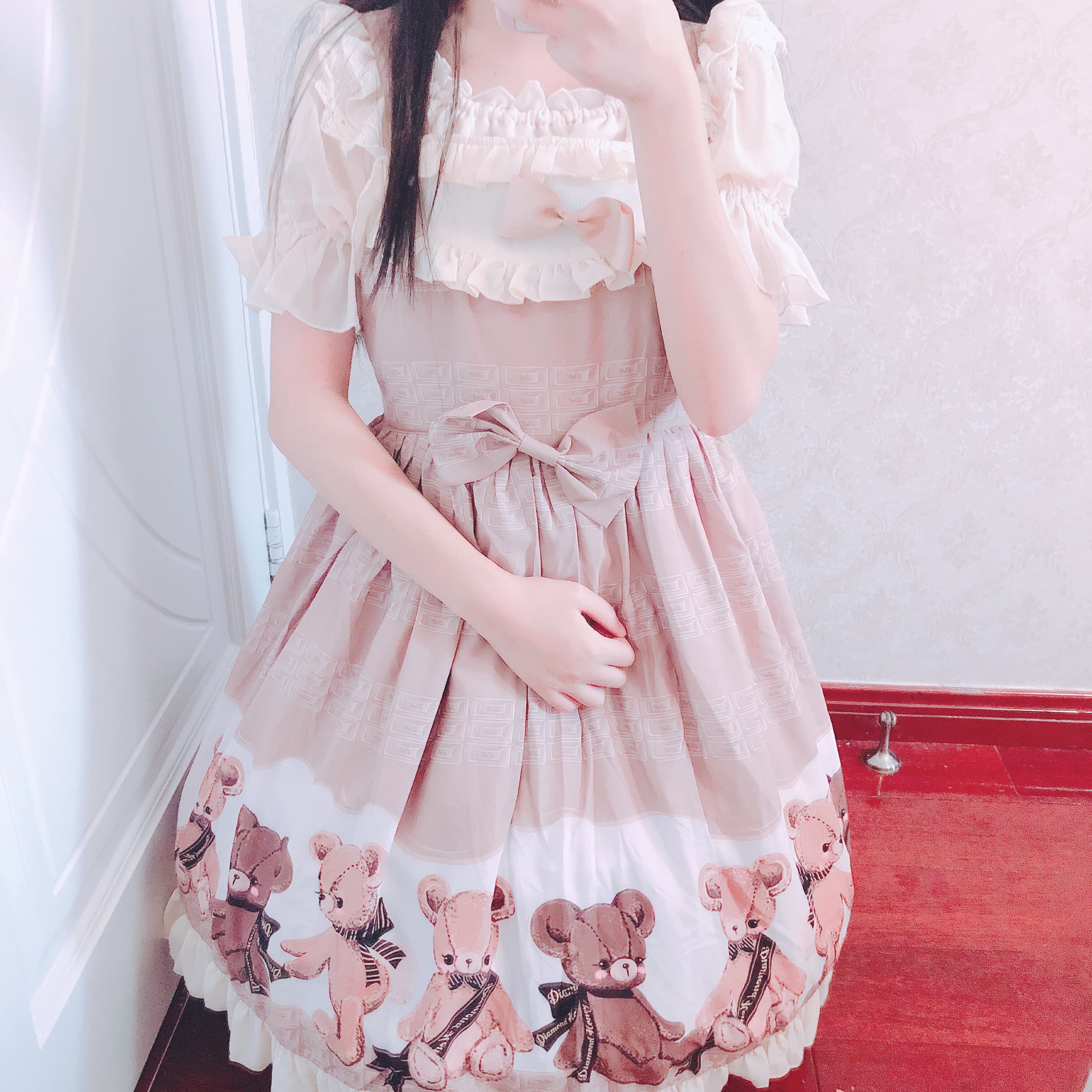 Close detail of stocking tops and smooth calves beneath a skirt, feet angled to display toes and arches