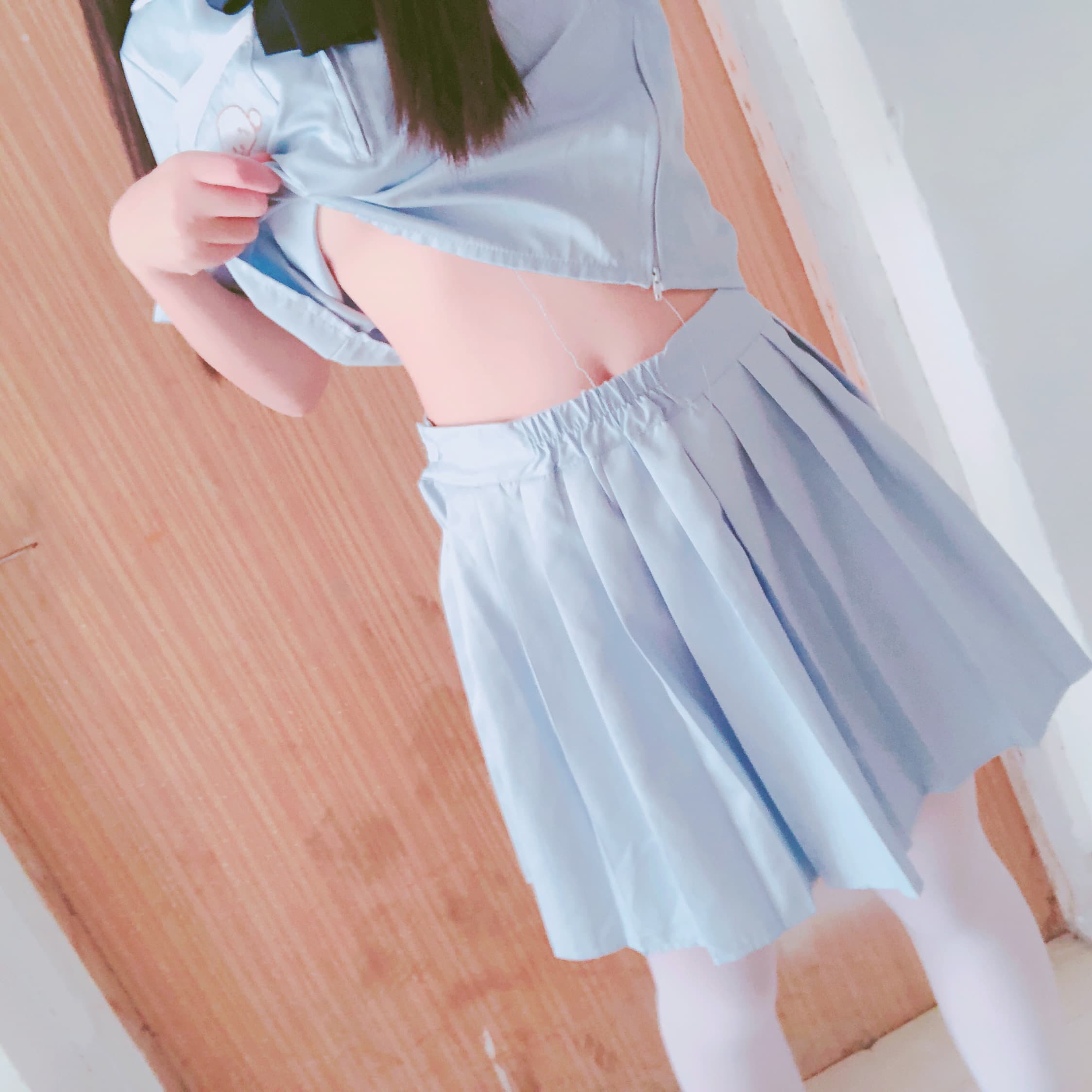 Feet peeking on dim stairs