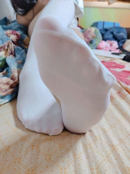 Taking Off the White Stockings I Wore All Day