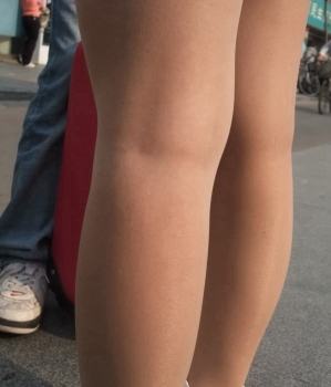 White cotton sock covers, stockings, street photo of a white skirt, white socks, white shoes girl