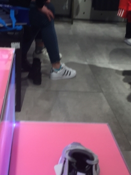 Queueing up to buy shoes, random shot