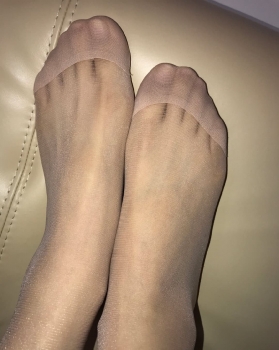 Beautiful feet on the sofa