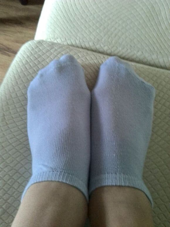 cotton socks hugging the arch