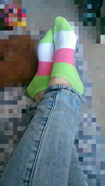 Bare nylon feet close-up