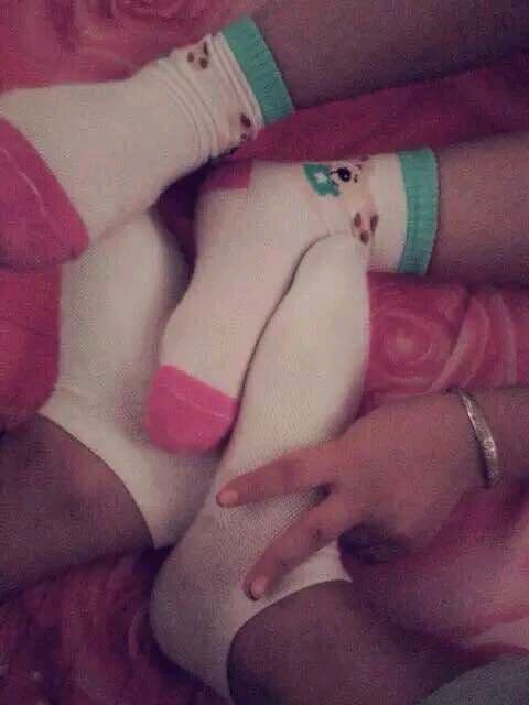 Worn cotton socks on feet