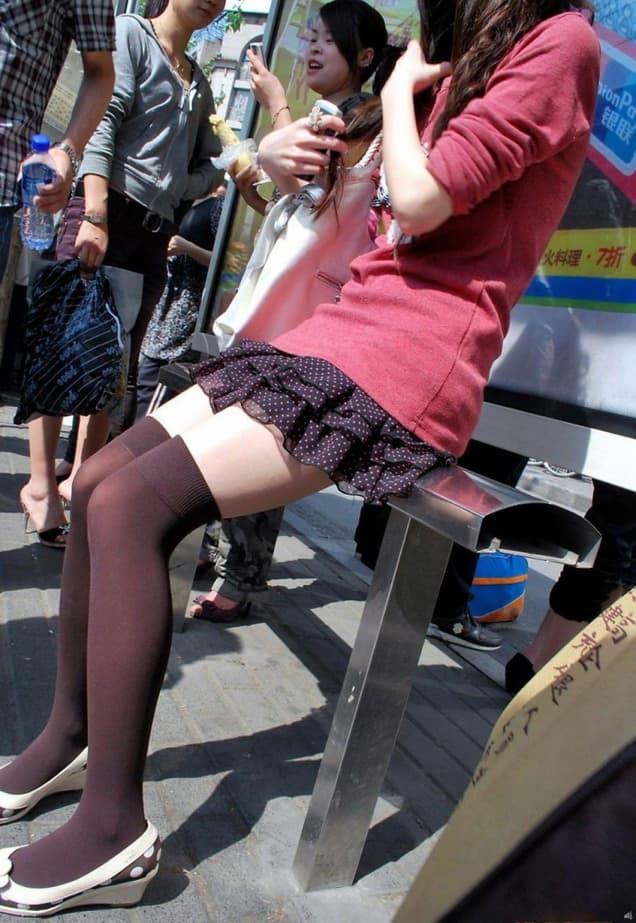 Real Shot of a Stockinged Girl at the Bus Stop