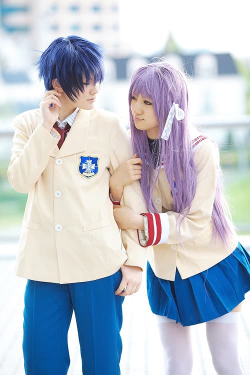 Final cosplay shot with white chrysanthemum dress, thigh-high stockings rolled down to reveal smooth calves and toes
