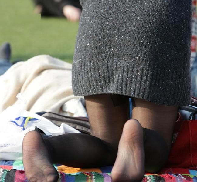 Silky black stockings on legs