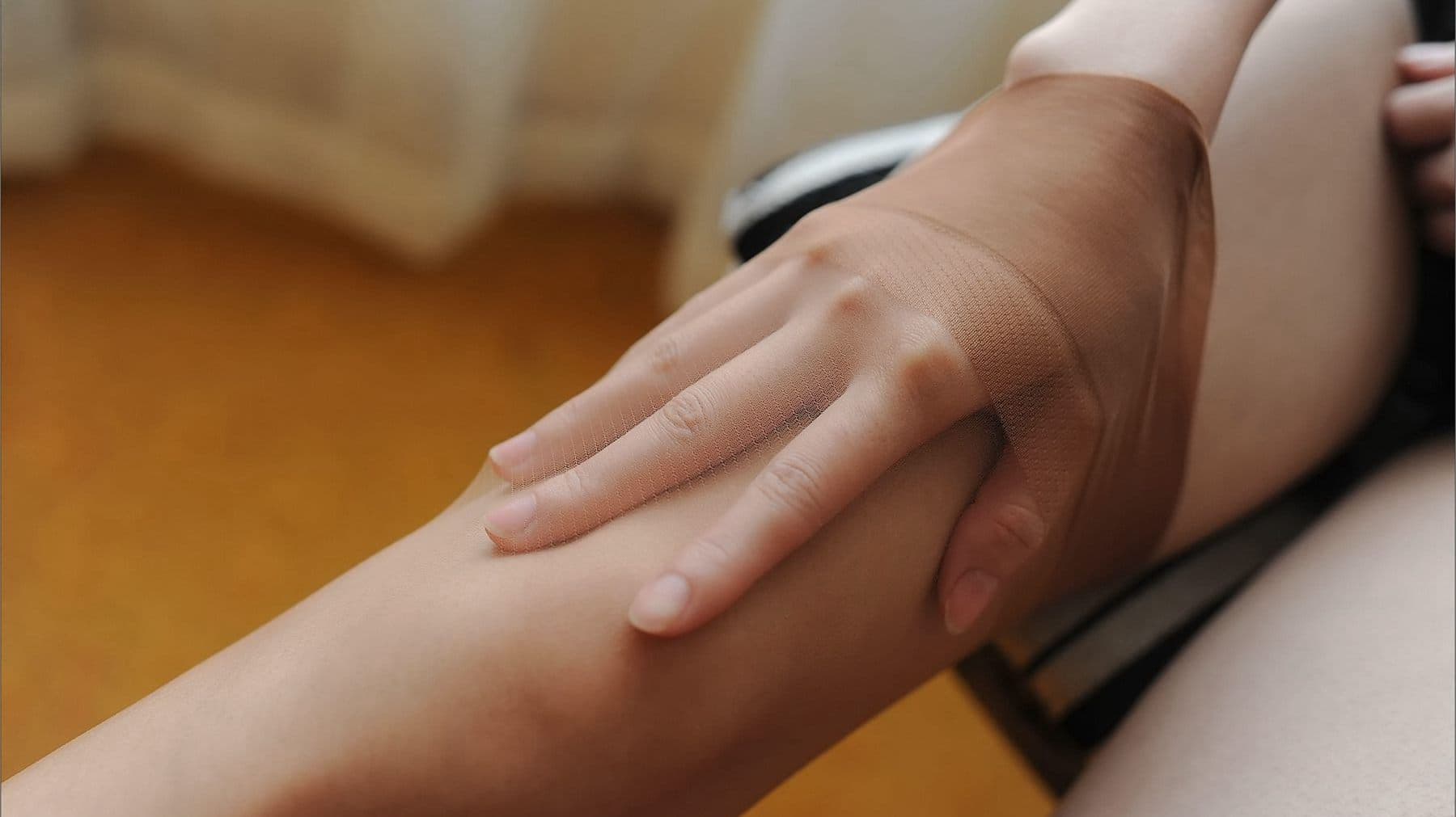 private close-up of stockinged feet and arches