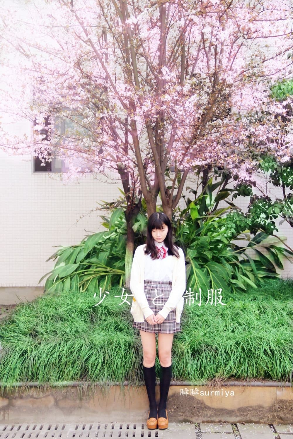 Adult model in a crisp uniform kneels, sheer nylon stockings glistening while she slips off one cotton sock revealing bare toes.