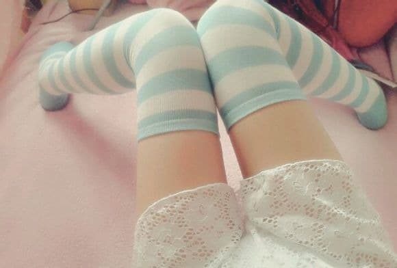 tiny feet in frilly socks
