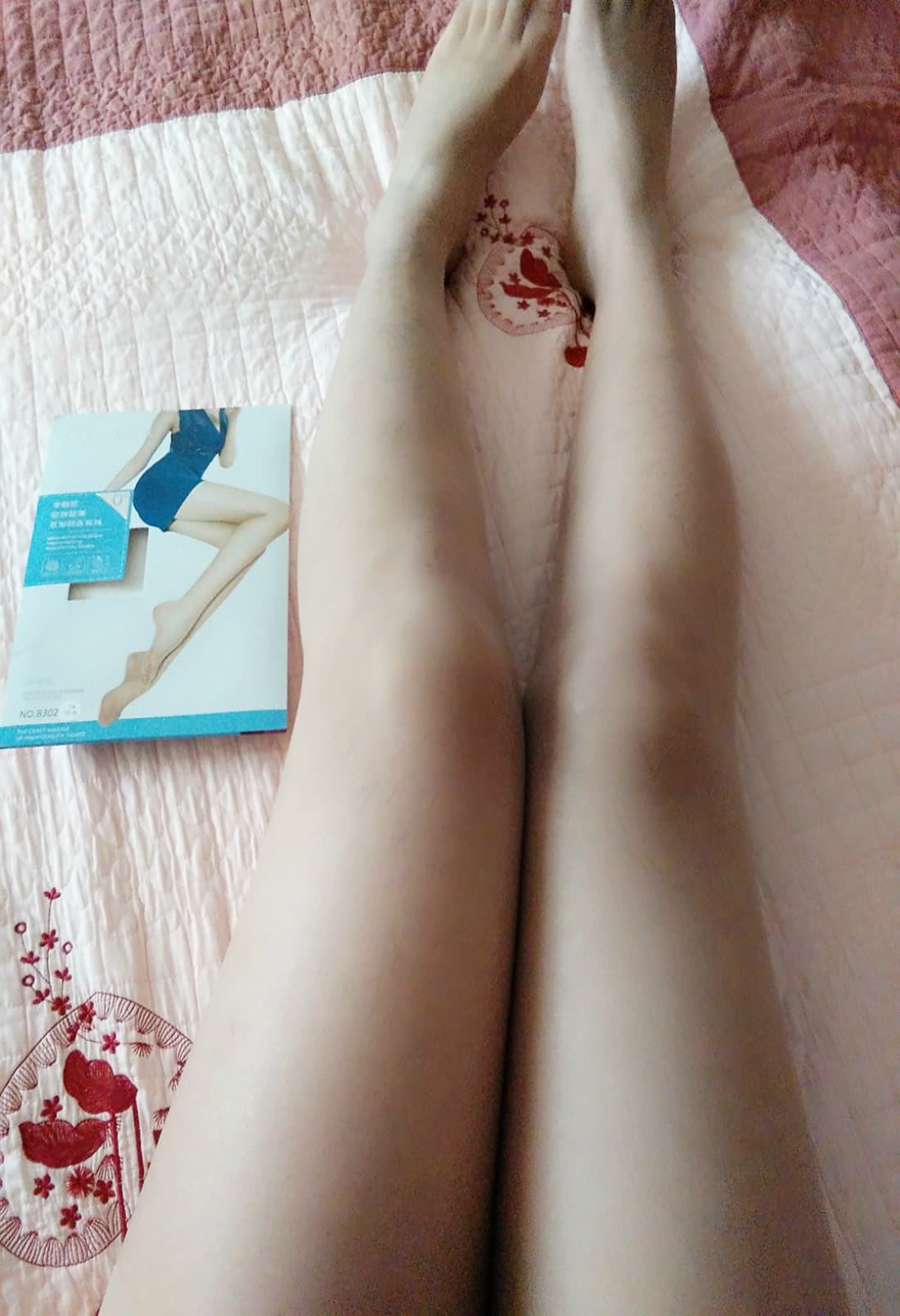 Ultra-thin sheer stockings stretched over toes and arches, highlighting every contour and translucence in soft studio lighting