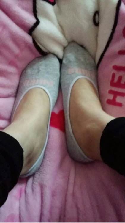 worn cotton socks hugging toes