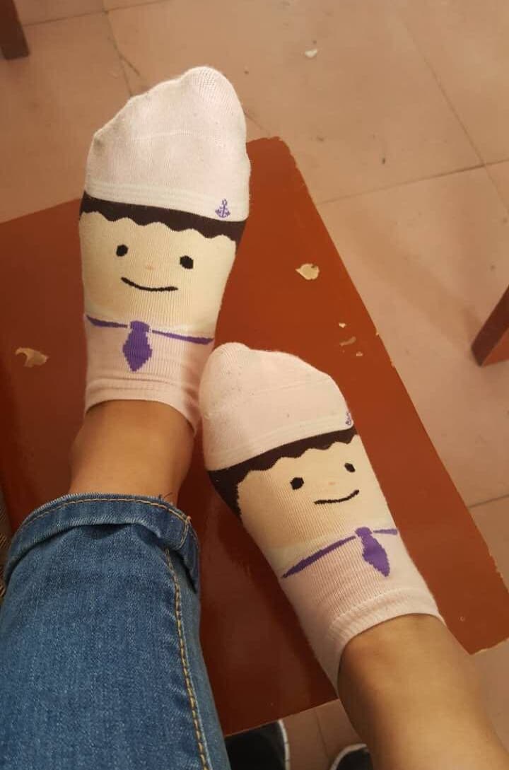 playful socks with tiny toes peeking