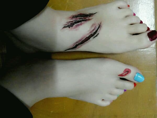 Slightly worn cotton socks abandoned near a doorway, fabric showing gentle stretches and creases that tell of a long day.