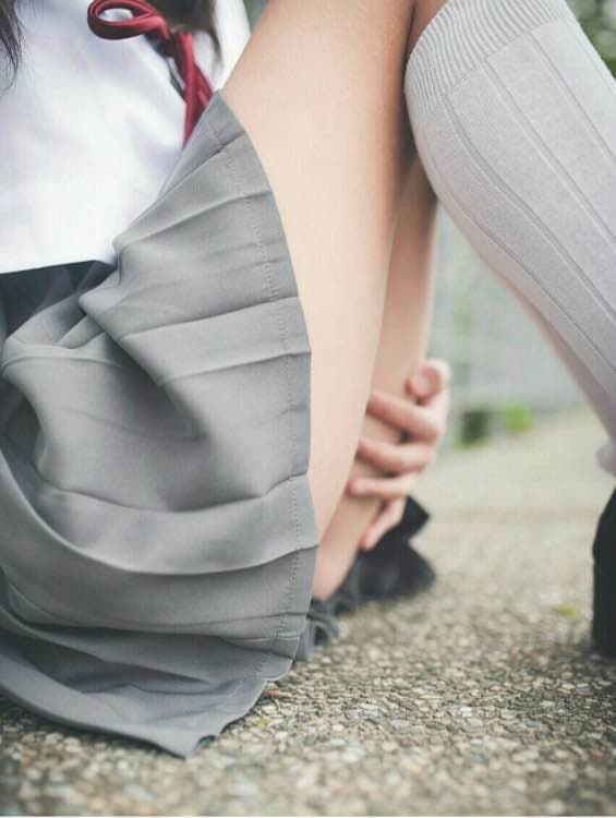 White silk billowing over toes