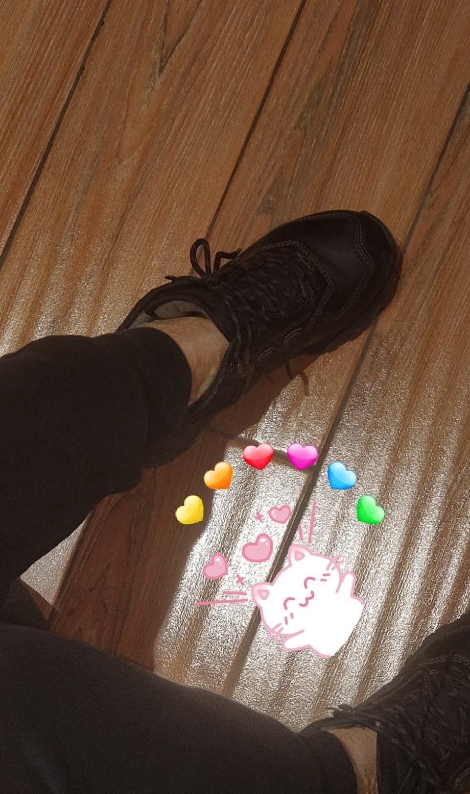 Array of short stockings on feet, different textures from ribbed cotton to sheer nylon side by side