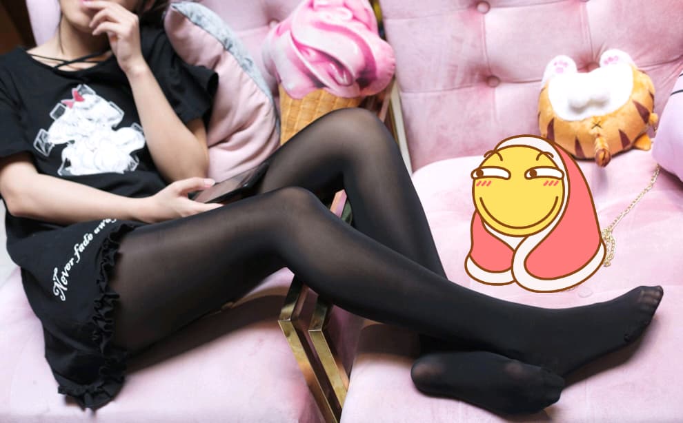 Cozy shot of feet wrapped in plush cotton socks with a soft, lived-in texture and relaxed toes