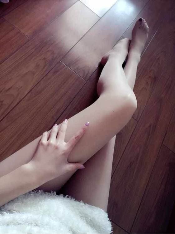 Series of candid photos showing bare feet on a couch and stockings rolled down in intimate, casual framing