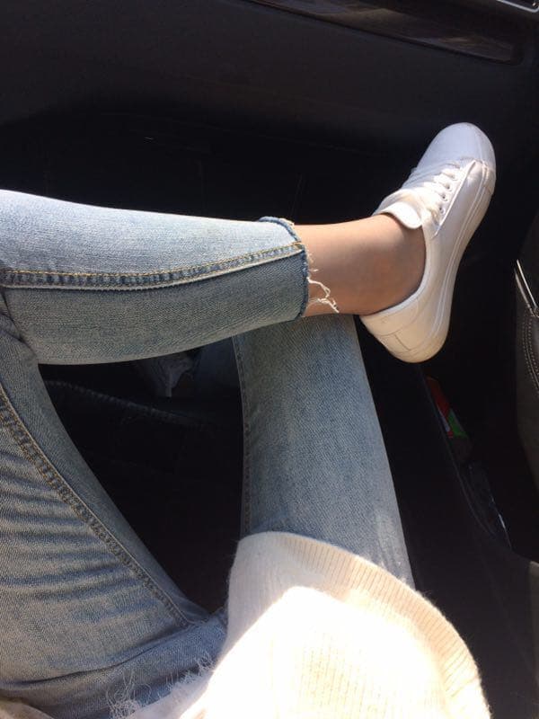 rear view of stockinged feet walking