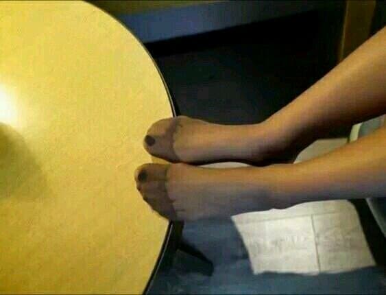 Tired bare soles with stocking lines