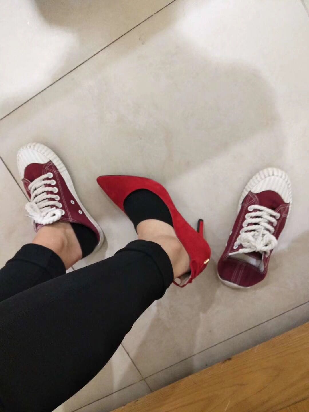 Nylon-clad feet lounging on sofa