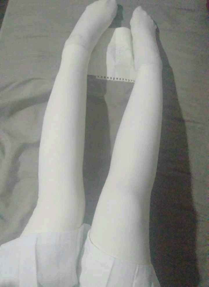 Young adult in white ankle socks