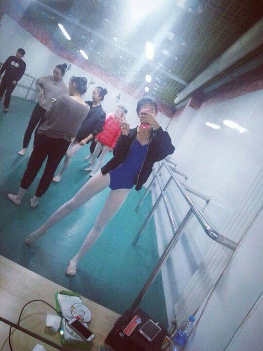 Arch posing in sheer stockings