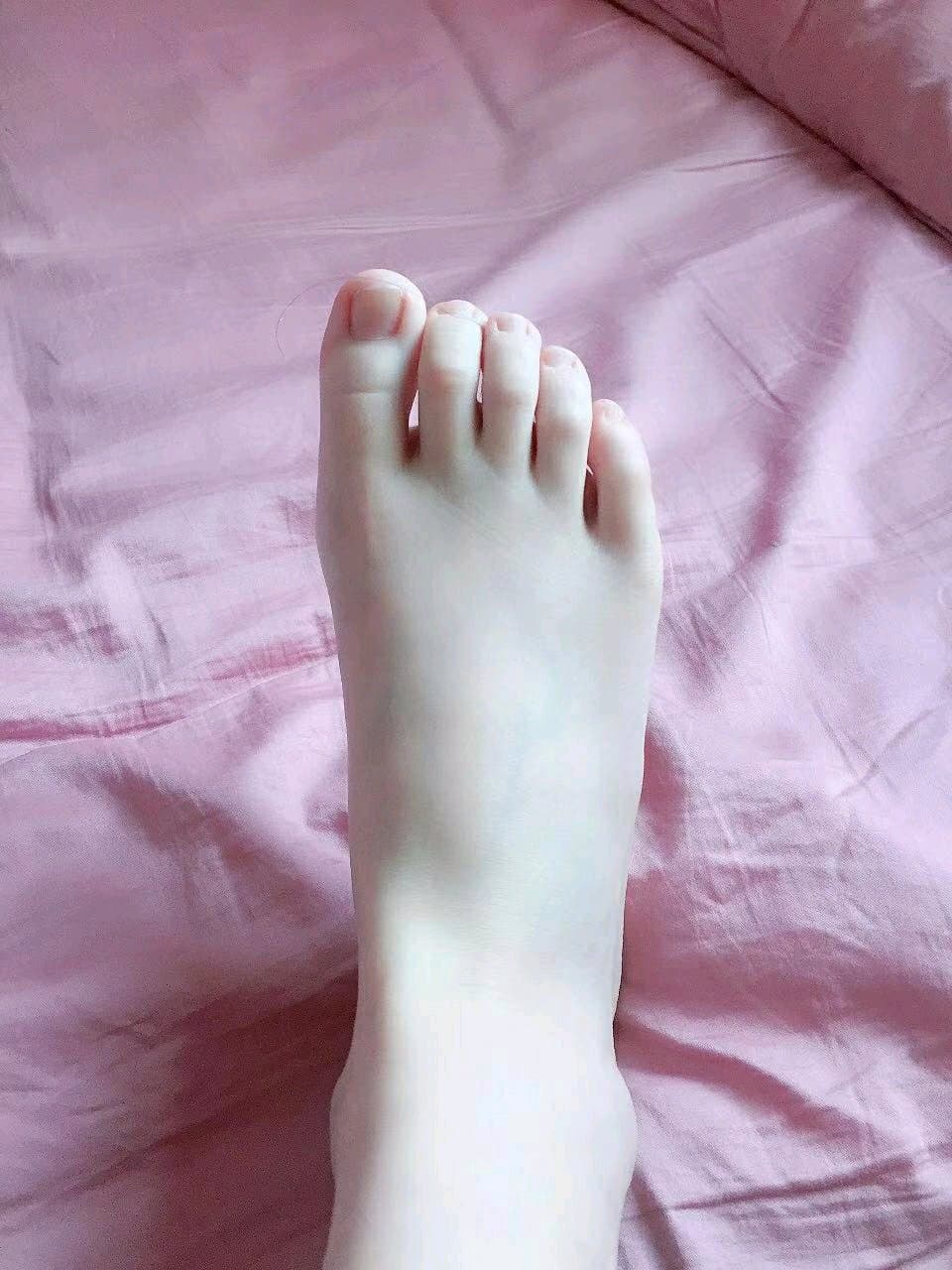 Shy feet in nylon stockings