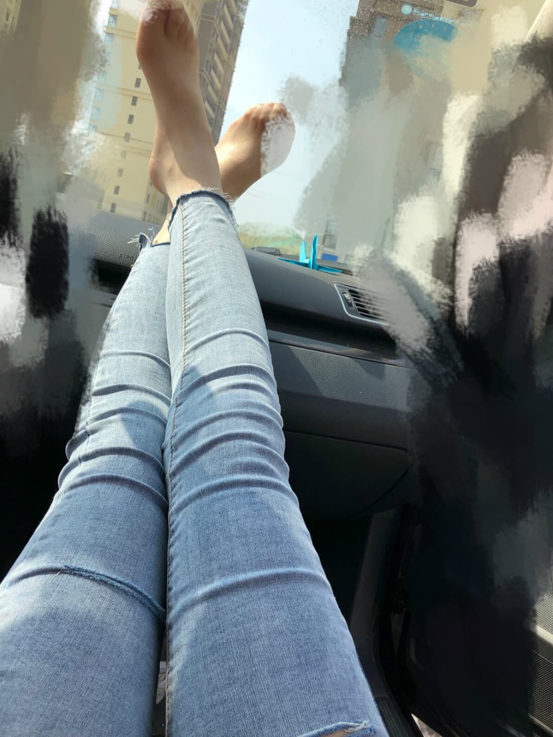 Stylish composition of a crossed leg in sheer stockings, clean shadows and cool tones