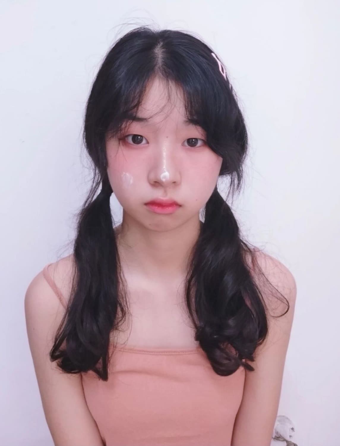 Detail of nylon-clad ankle and exposed toes, warm light capturing the novelty and delicate texture