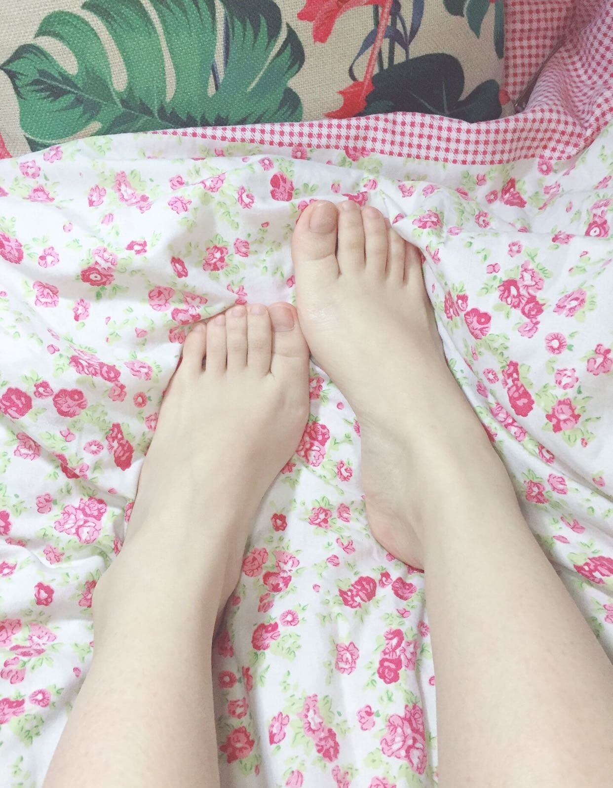 Close view of a folded pair of cotton socks with subtle wear, delicate scent imagined, presented as a playful, intimate prize.