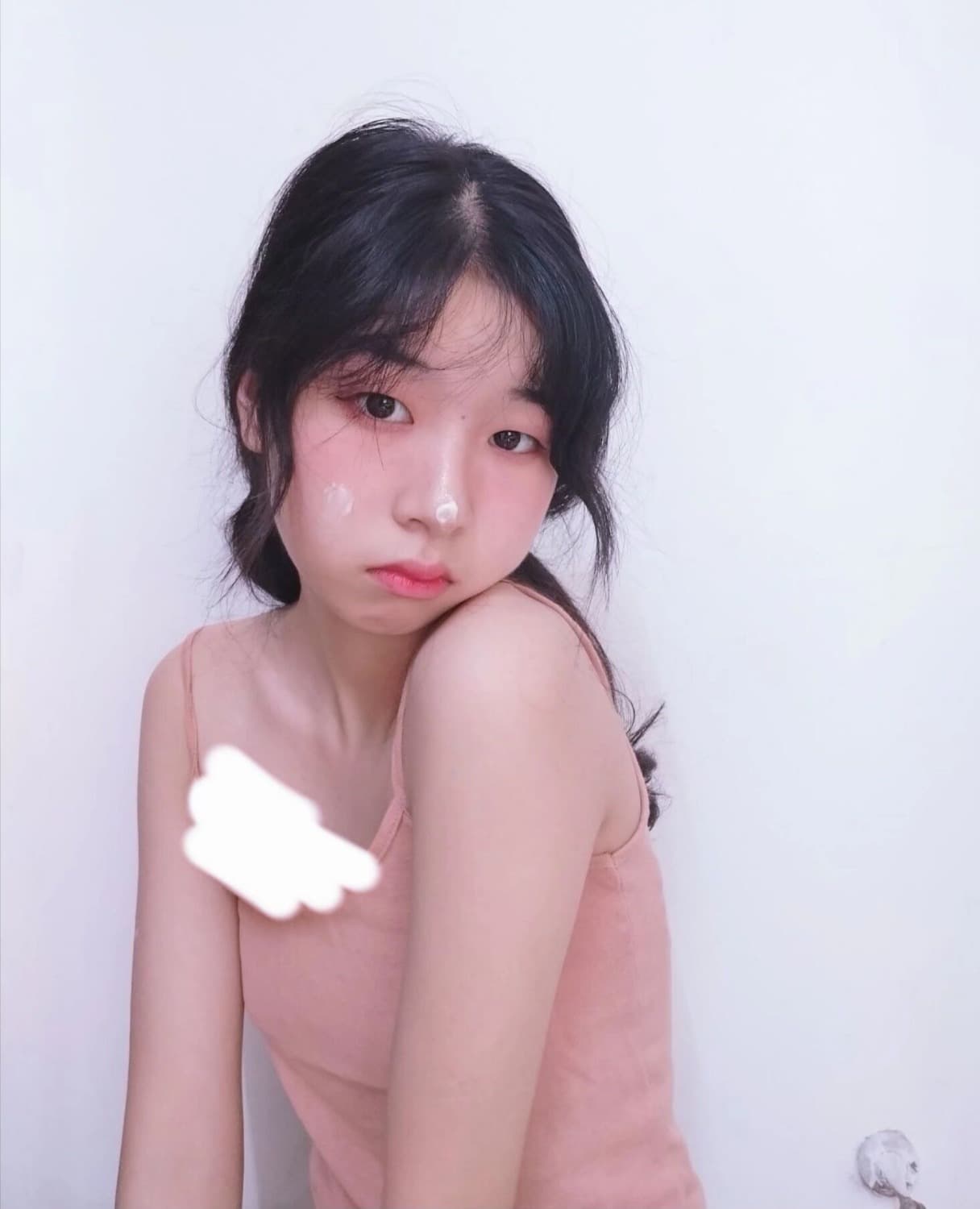 Gallery-style close-up of varied feet in cotton socks and silk stockings arranged on soft fabric