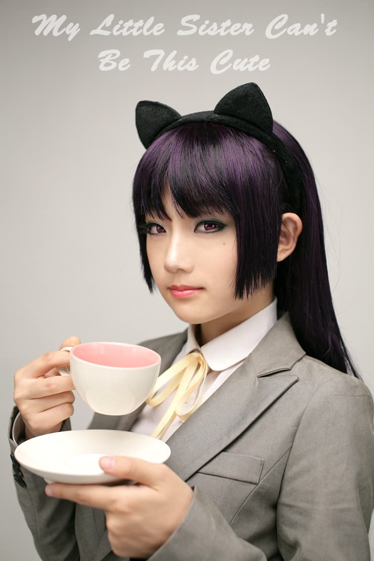 Cosplayer in character knee socks and sheer stockings posing to highlight arches and calf lines