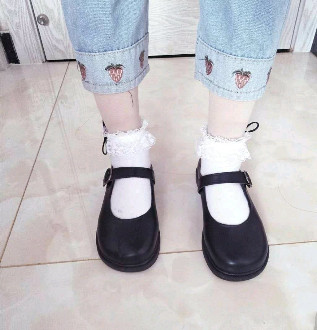 sunlit bare feet with sheer stockings