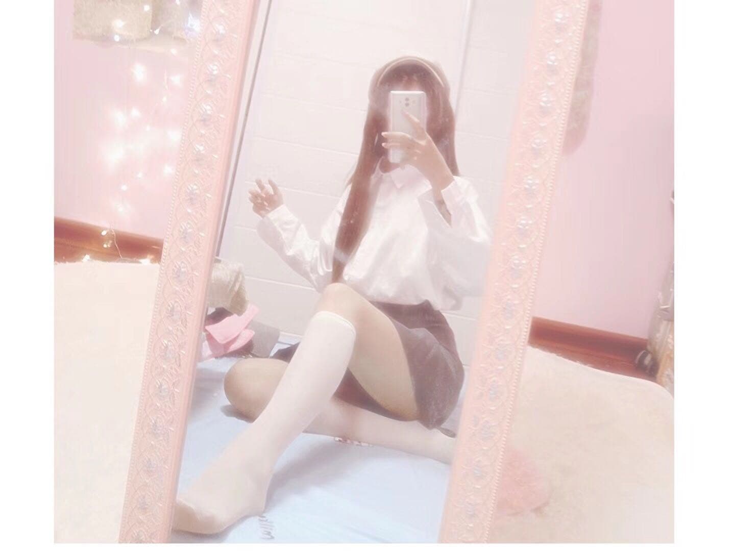 Toe-focused close-up of a foot slipping from a shoe, stocking ladder beginning at heel, warm tones and soft focus