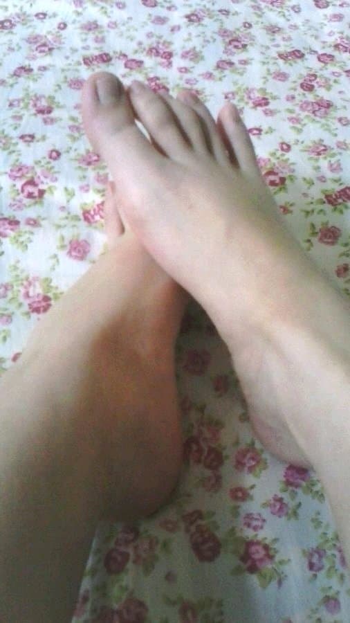 Damp cotton socks clinging to toes