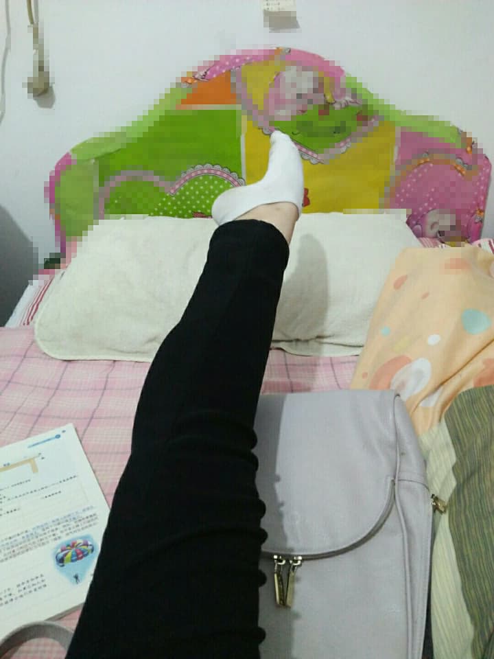 Peeking toe from cotton sock