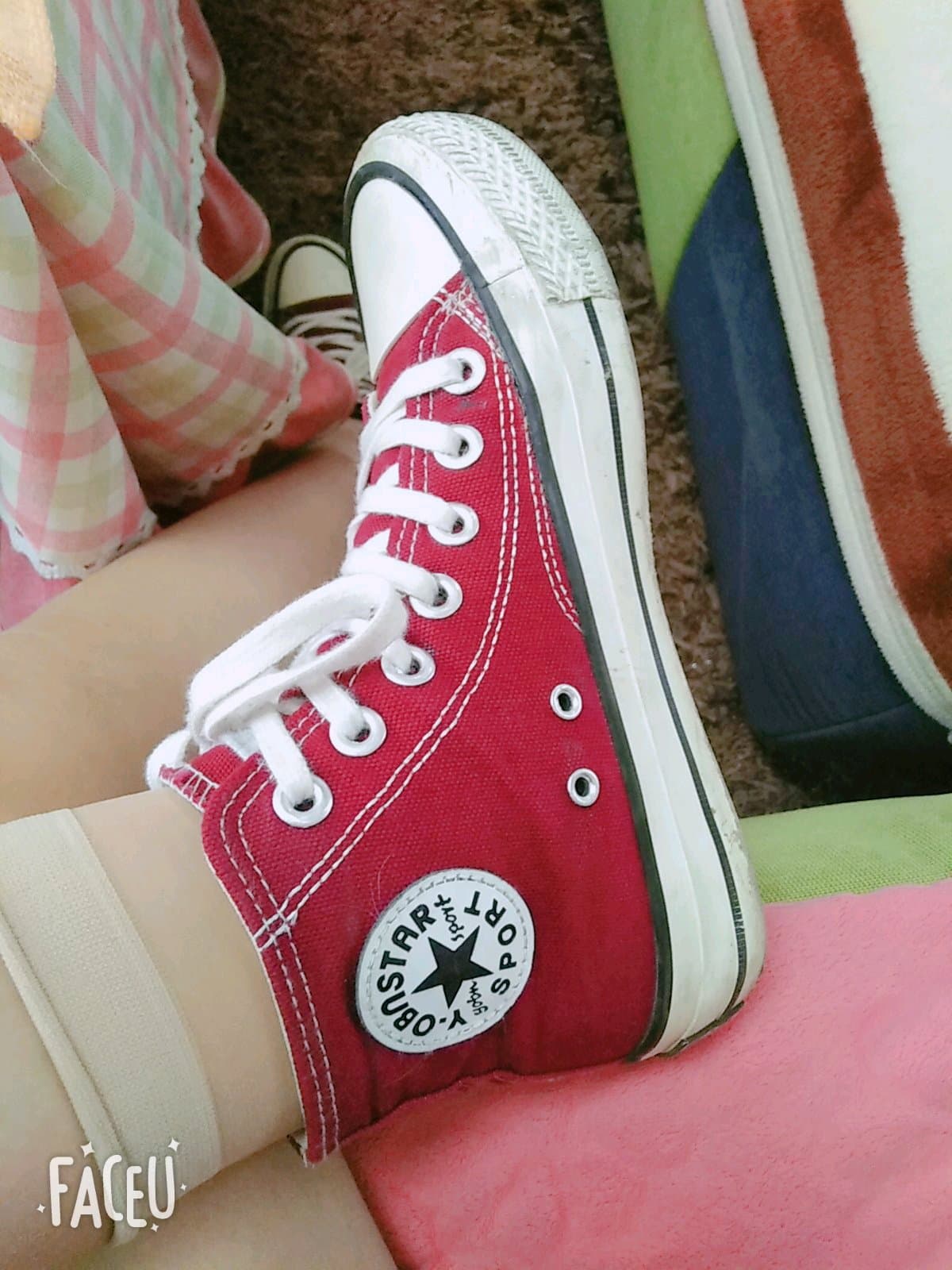 Daily shots of a college-aged woman’s feet in various socks and stockings, highlighting lived-in textures and casual poses