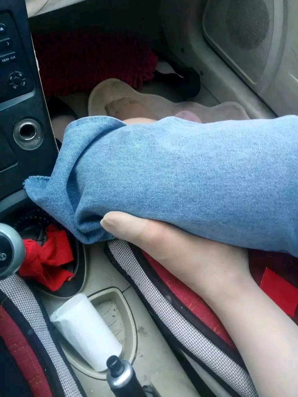 Nude silk hugging bare toes