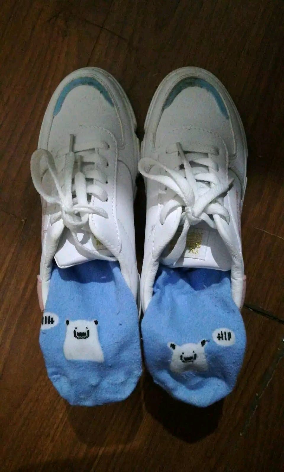 Shy toes barely showing from socks