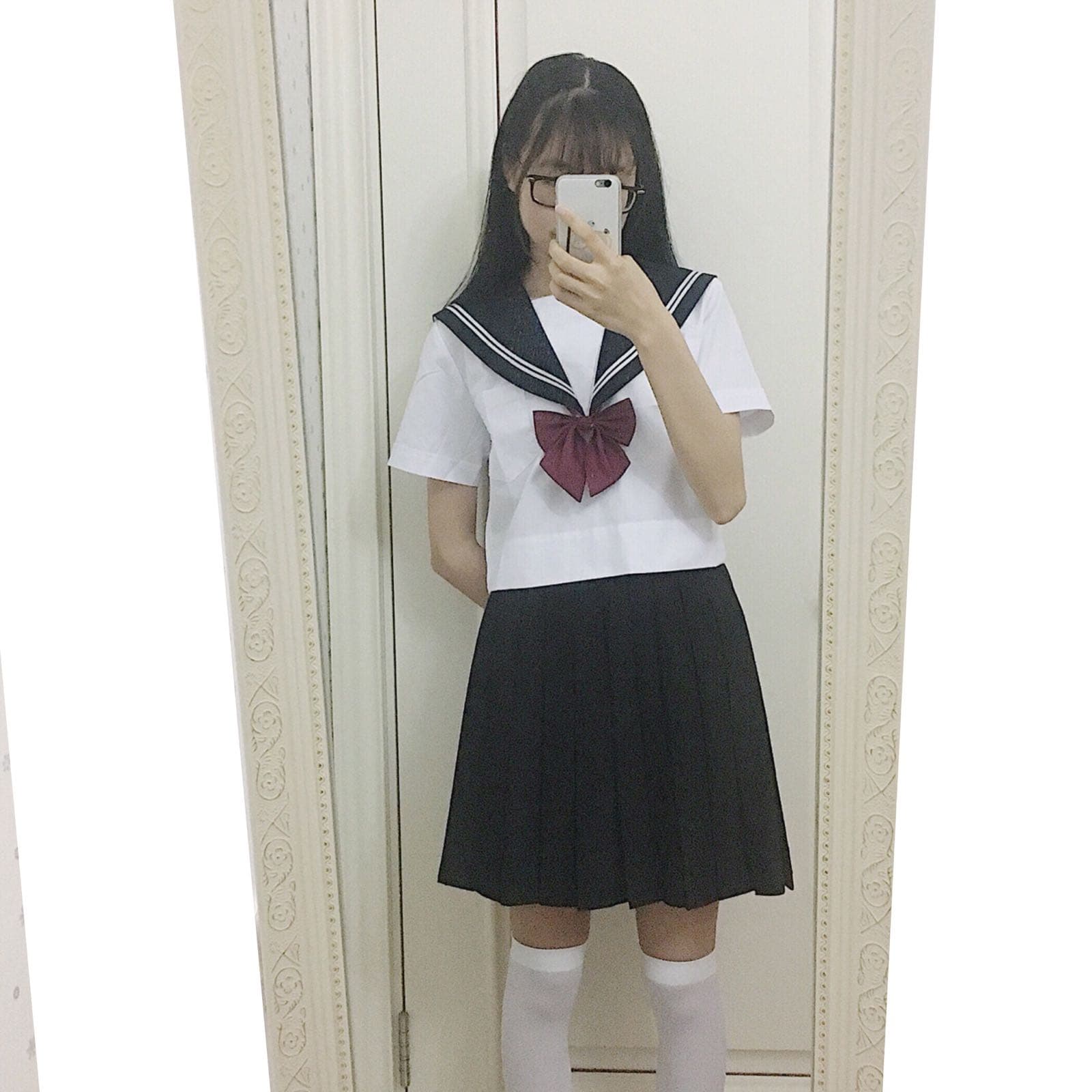 row of dresses with matching stockings and socks on display