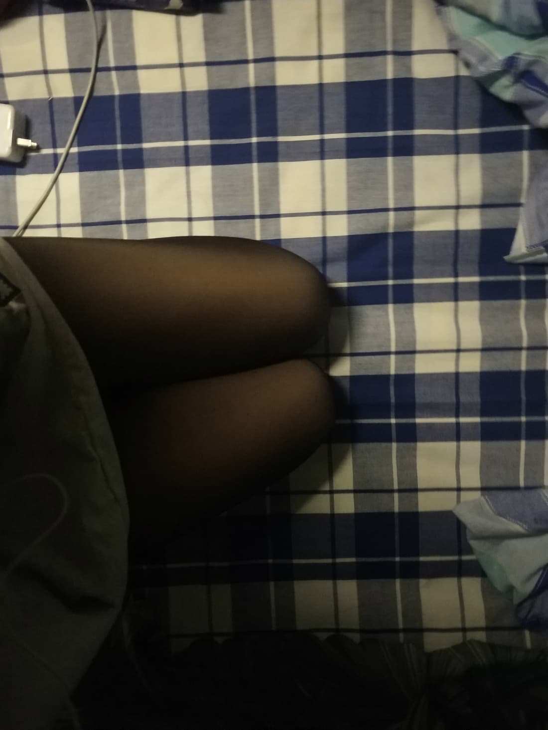 Hesitant toe peeking from nylon